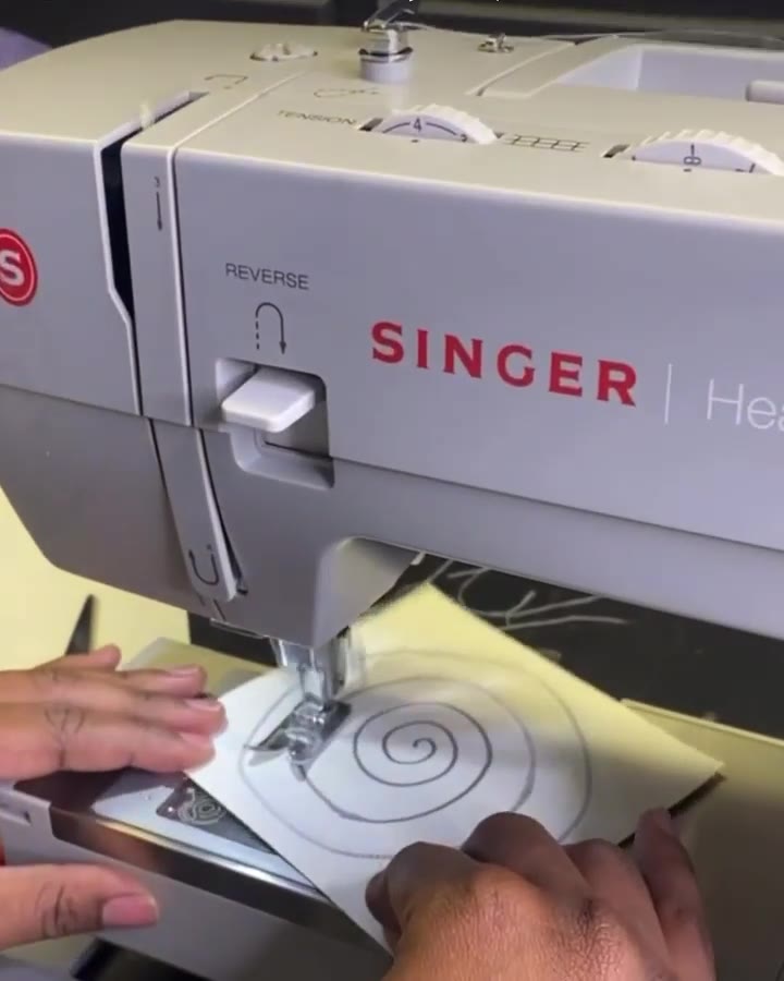 Sewing a wig cap on a Singer machine in the Youknowigs studio