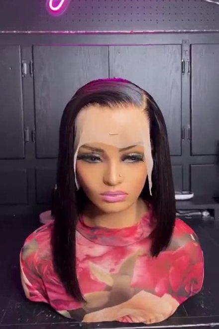 Sleek black bob, custom unit on a mannequin