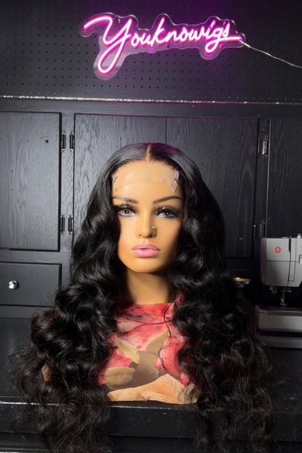 Black loose wave, custom unit on a mannequin